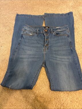 High-Rise Flare Jeans in Medium Blue - Stretch Denim
